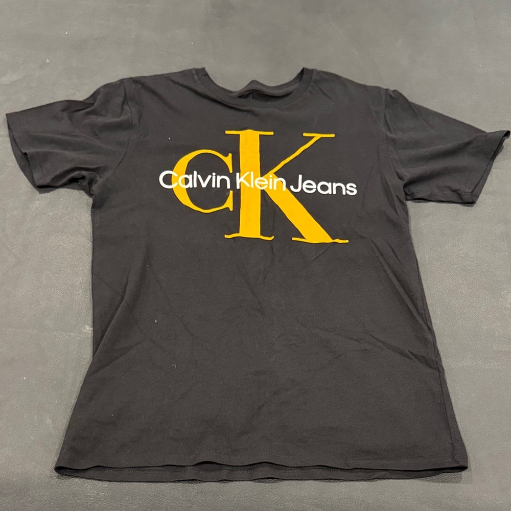 Calvin Klein Black Tee with Bold Yellow CK Logo